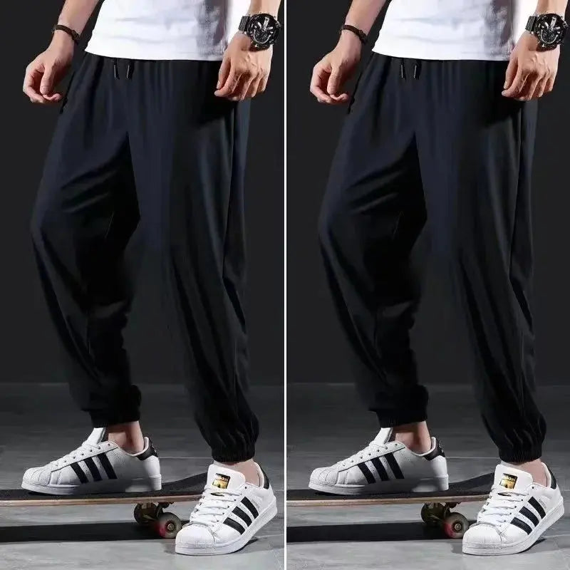 Summer Quick-drying Ice Silk Casual Pants Men's Ultra-thin Elastic Nine-point Pants Loose Drape Solid  Beam Feet Pants 7XL Suncollections