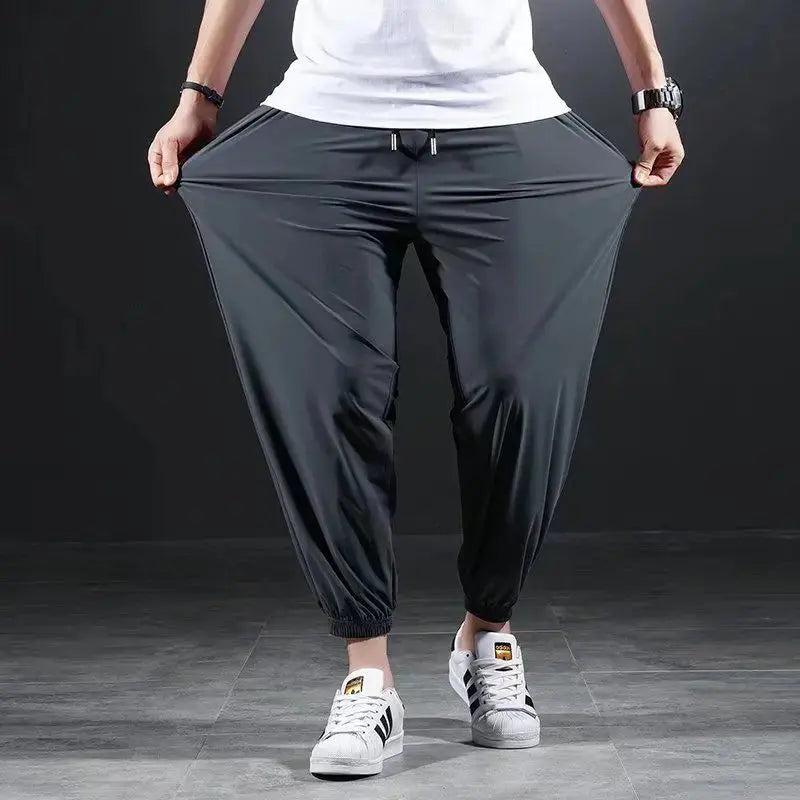 Summer Quick-drying Ice Silk Casual Pants Men's Ultra-thin Elastic Nine-point Pants Loose Drape Solid  Beam Feet Pants 7XL Suncollections