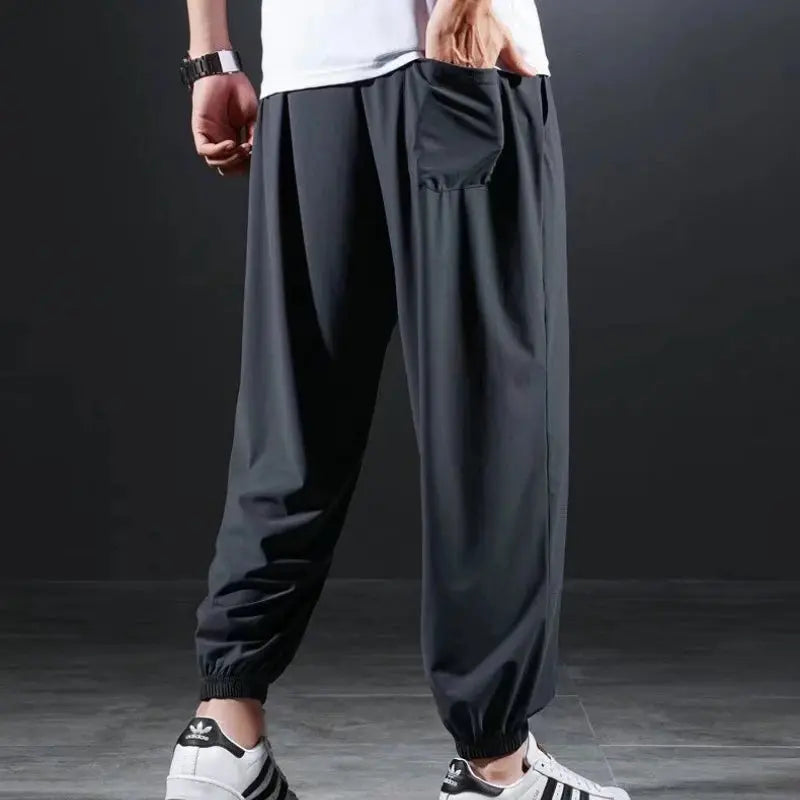 Summer Quick-drying Ice Silk Casual Pants Men's Ultra-thin Elastic Nine-point Pants Loose Drape Solid  Beam Feet Pants 7XL Suncollections